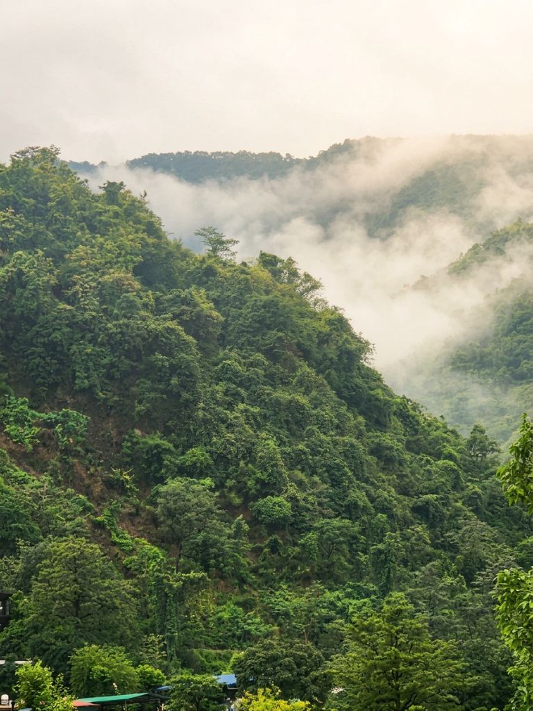 Misty morning valley and foothills